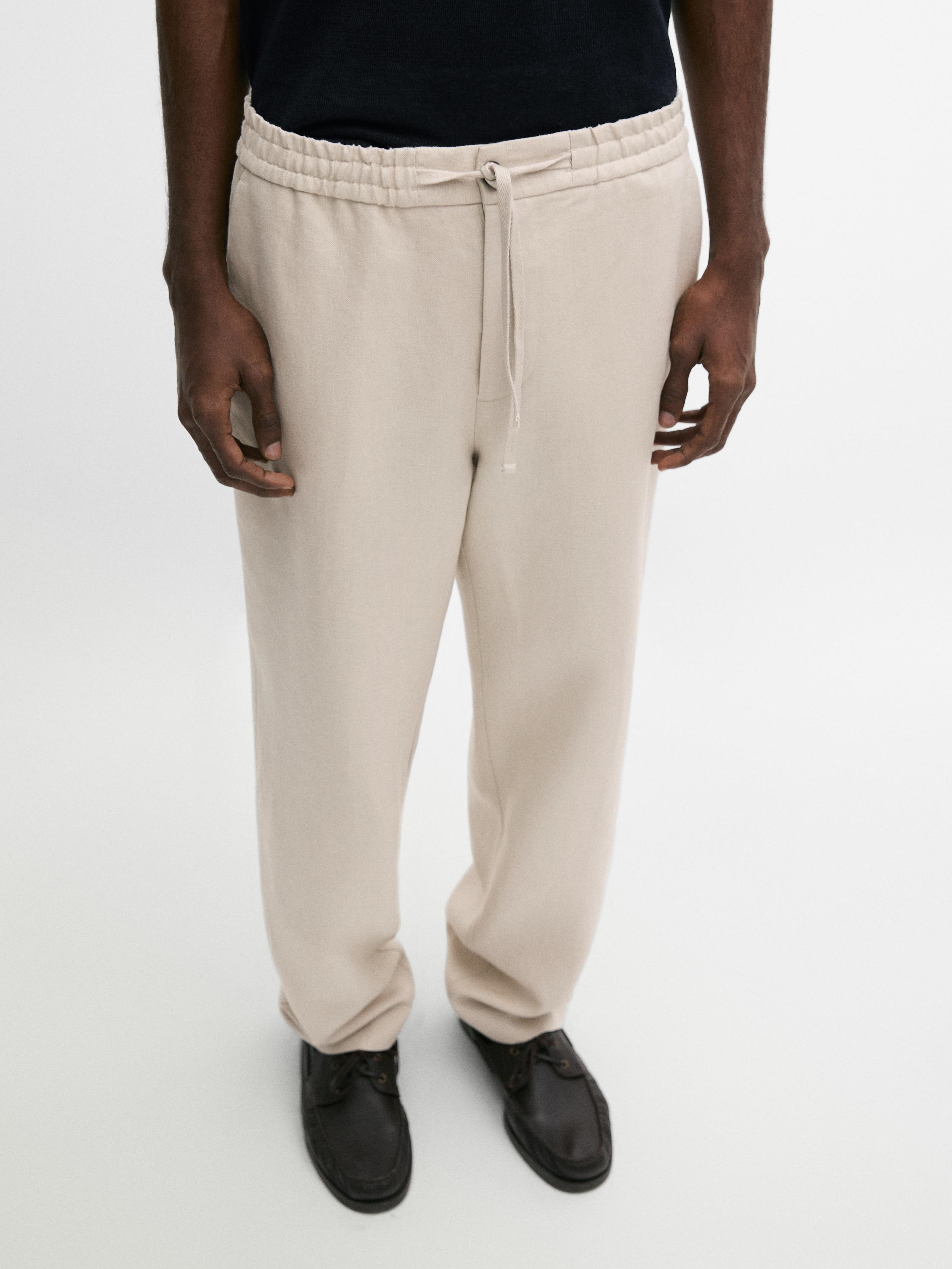 Total look linen trousers with waist detail